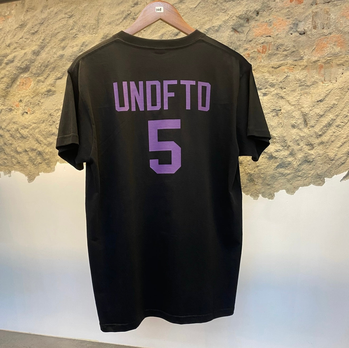 Undefeated “Tokyo 5” Graphic Tee – Black/Purple