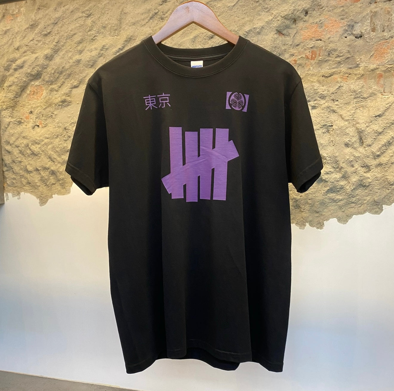 Undefeated “Tokyo 5” Graphic Tee – Black/Purple