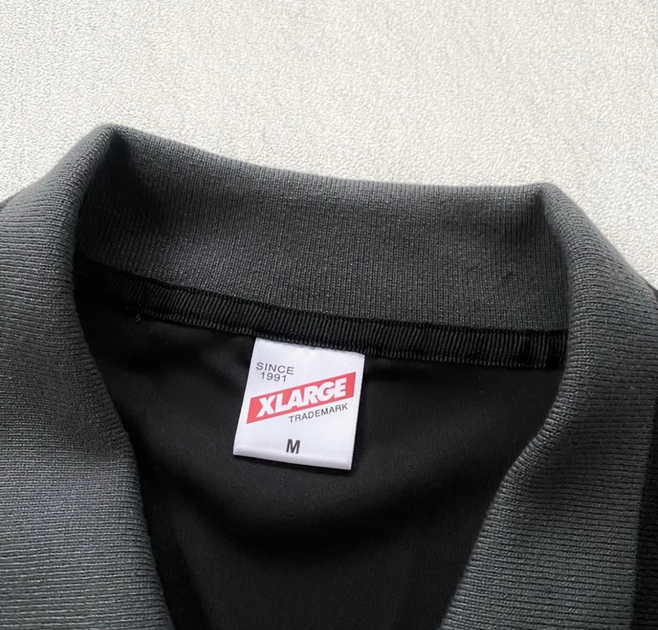 XLARGE™ Football Jersey – Black