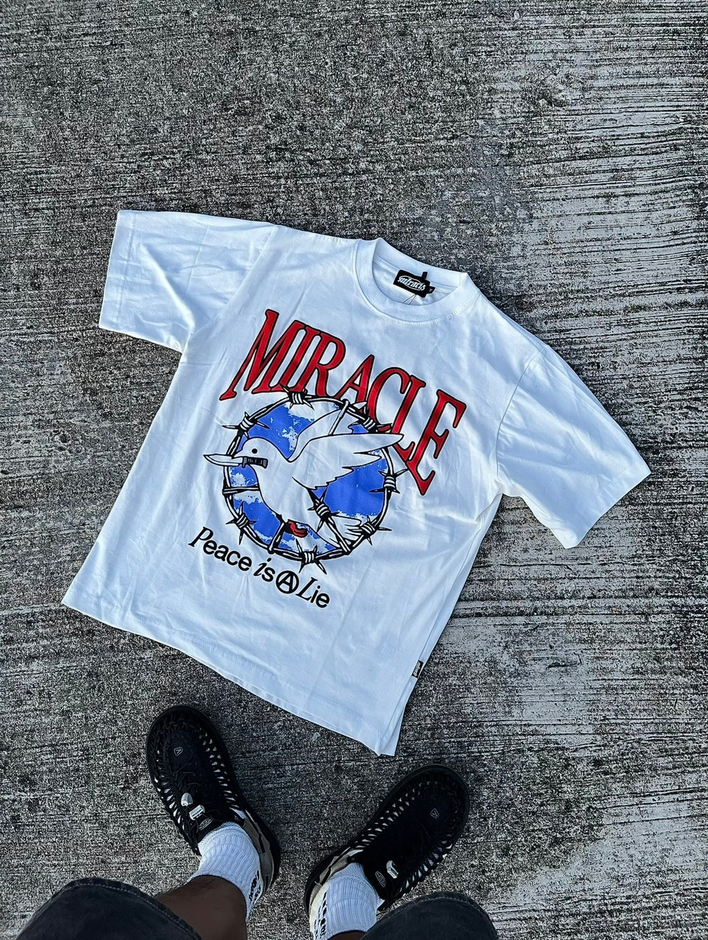 Miracle Mates – Peace is a Lie Graphic Tee (White)