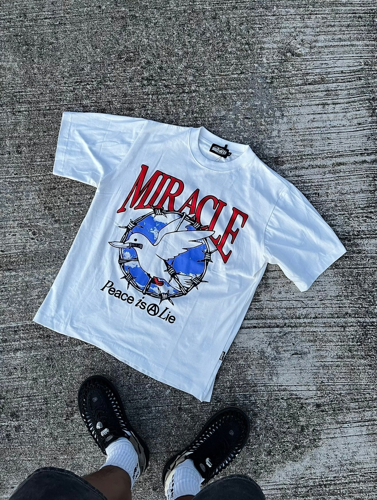 Miracle Mates – Peace is a Lie Graphic Tee (White)
